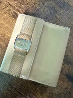 Salvatore Ferragamo Cream Leather Bifold Wallet with Signature Gancini